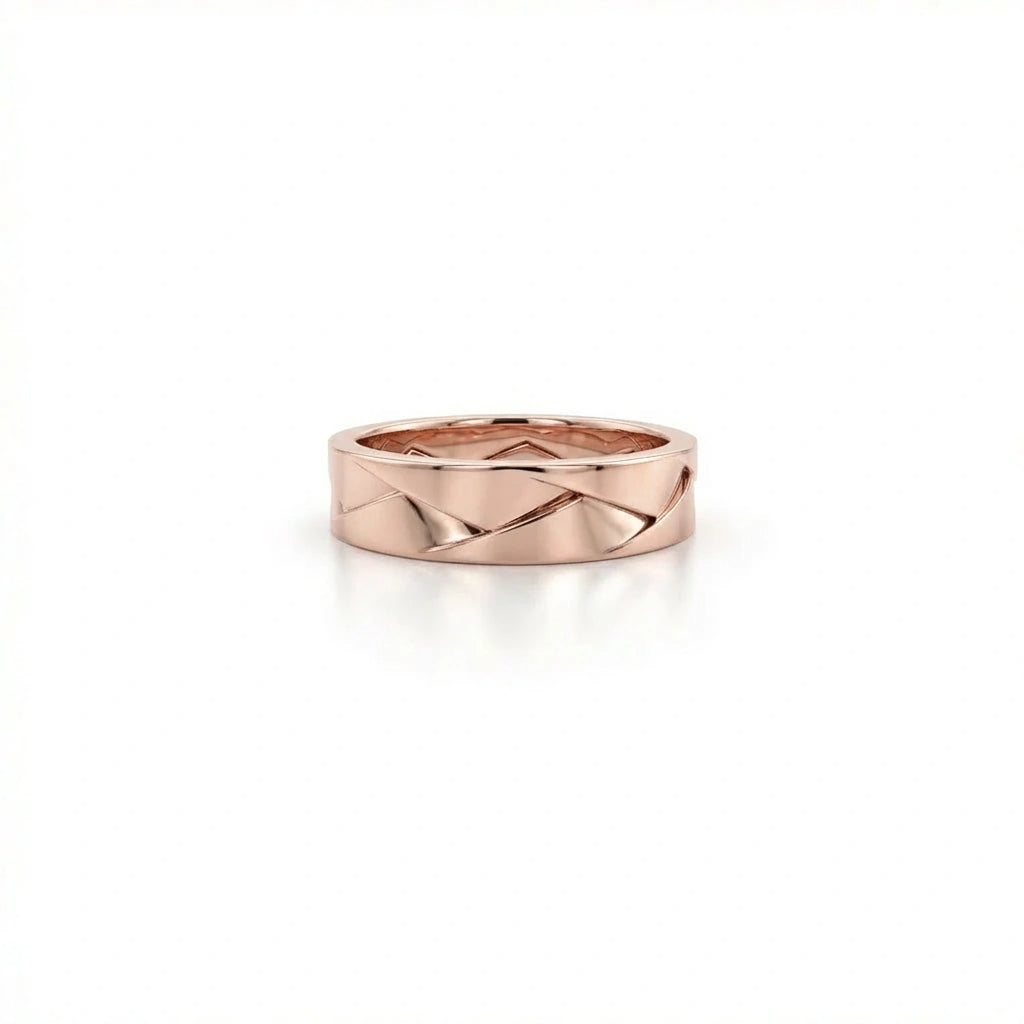 Apex interlock facet band in solid 14K rose gold with modern geometric carved design
