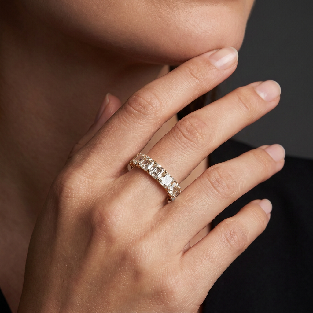Asscher cut Lab-Grown Diamond half eternity band in 14K yellow gold worn on the hand