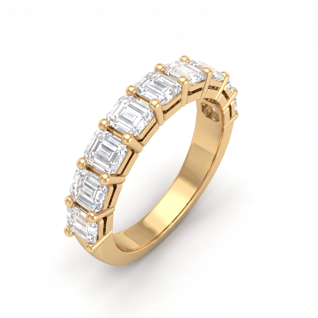 Angled view of the four-prong basket settings on an Asscher cut Lab-Grown Diamond half eternity band in 14K yellow gold