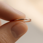 traditional high dome wedding band on finger