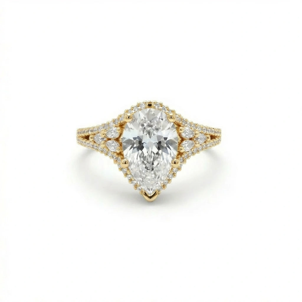 Aurelia Crown Pear Diamond Ring in 14K yellow gold - top view showing marquise crown halo and split shank
