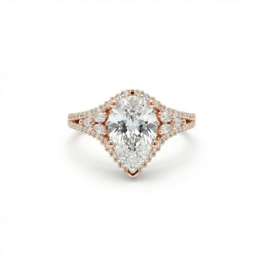 Aurelia Crown Pear Diamond Ring in 14K yellow gold - top view showing marquise crown halo and split shank
