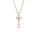 Aurex Aries Zodiac Diamond Necklace in 14K rose gold, front view showing ram horn symbol, diamond stem, and star bail on cable chain