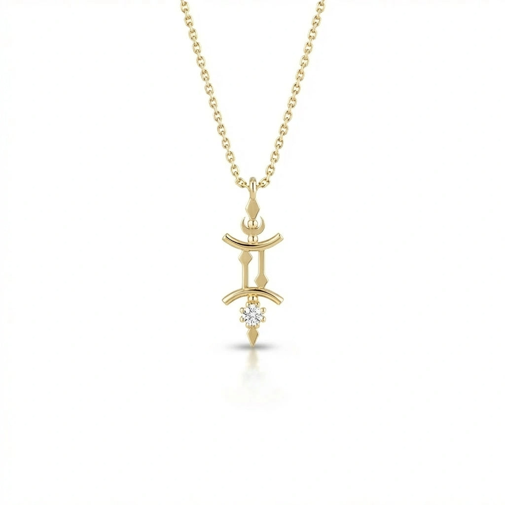 Aurex Gemini Zodiac Diamond Necklace in 14K yellow gold, front view showing twin pillar Gemini symbol with diamond drop and faceted bail on cable chain