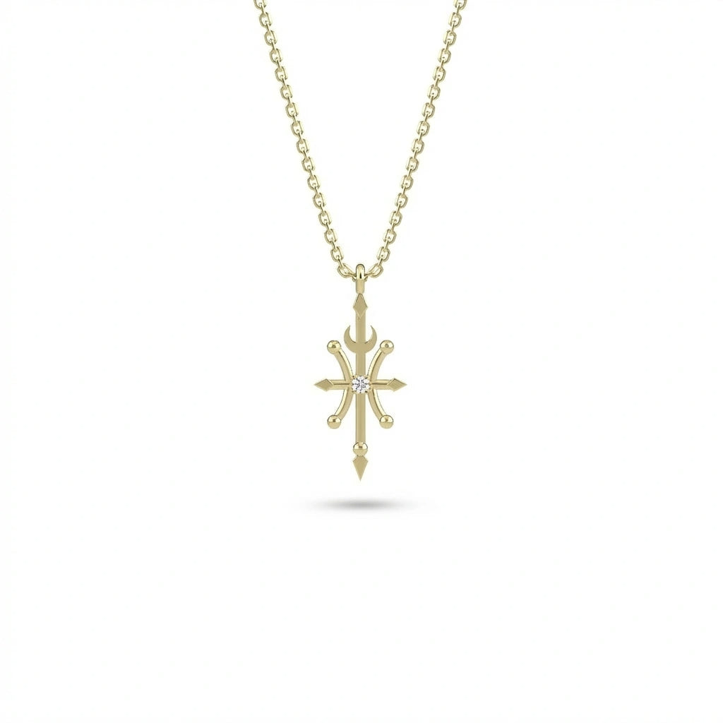 Aurex Pisces Zodiac Diamond Necklace in 14K yellow gold, front view showing sculptural cross form with crescent moon, four arrow points, ball terminals, and center lab-grown diamond on cable chain