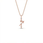 Aurex Sagittarius Zodiac Diamond Necklace in 14K rose gold, front view showing diagonal arrow glyph with crescent moon accent and three lab-grown diamonds on cable chain