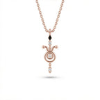 Aurex Taurus Zodiac Diamond Necklace in 14K rose gold, front view showing bull horns with ball tips, center diamond circle, black diamond bail, and diamond drop on cable chain
