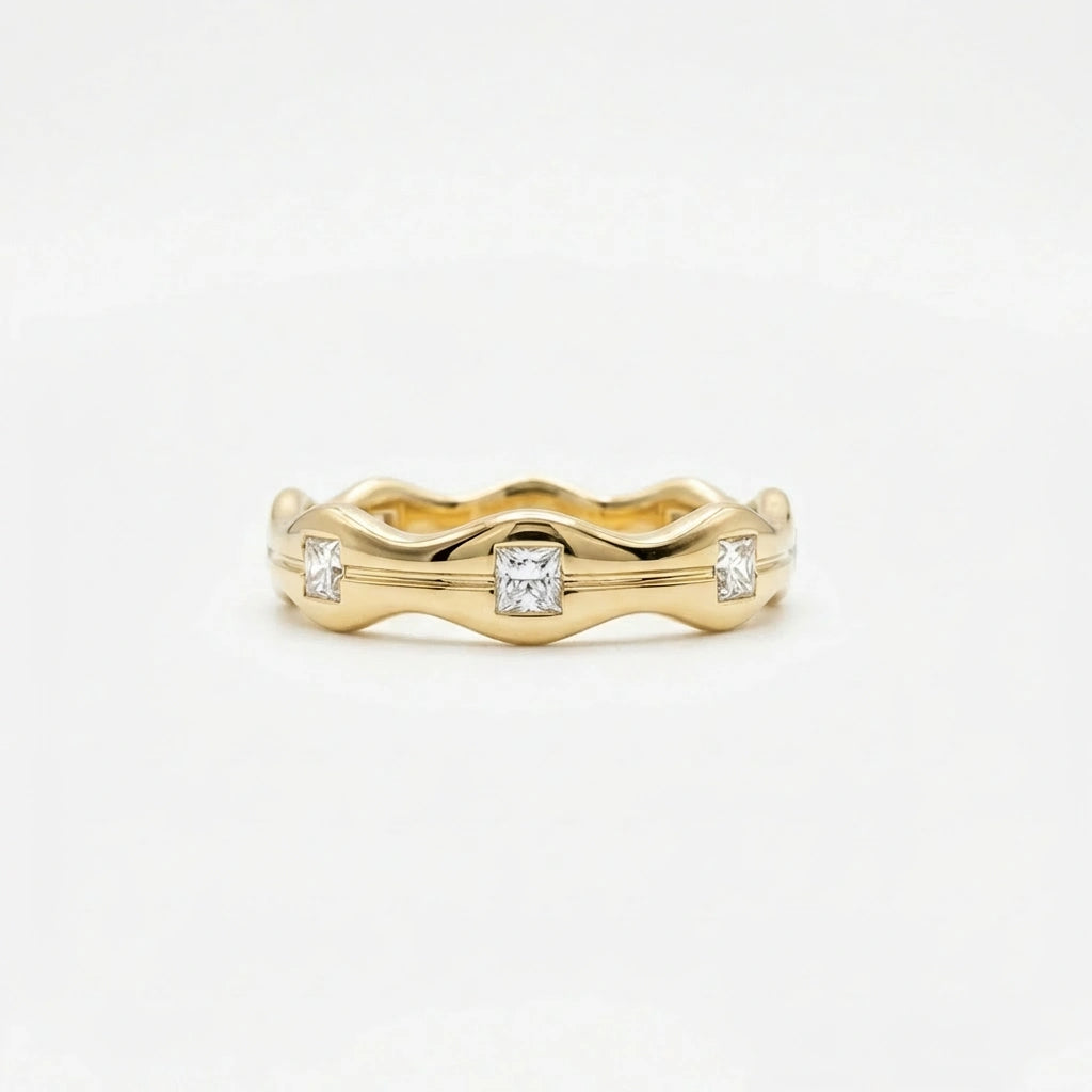 Aurex Wave Princess Diamond Band in 14K yellow gold - front view showing sculptural wave silhouette and diamond details.