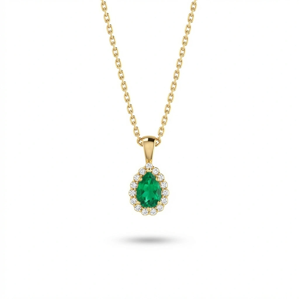 Aveline emerald halo pendant in solid yellow gold showcasing pear shaped emerald with surrounding round diamond halo