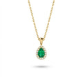 Aveline emerald halo pendant in solid yellow gold showcasing pear shaped emerald with surrounding round diamond halo