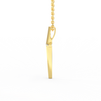 Side view of 14K yellow gold minimal cross pendant showing tapered thickness