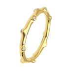 angled view of Bamboo Diamond Ring Gold showing bamboo-style design with sparkling diamonds.