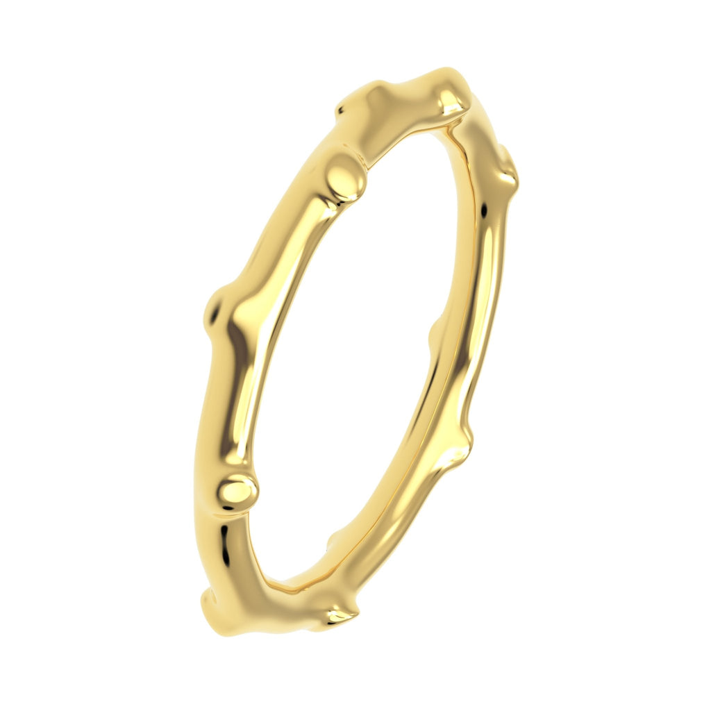 Angle View of organic bamboo gold ring, nature-inspired band
