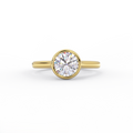 Bezel set round lab grown diamond solitaire ring in 14K yellow gold, front view