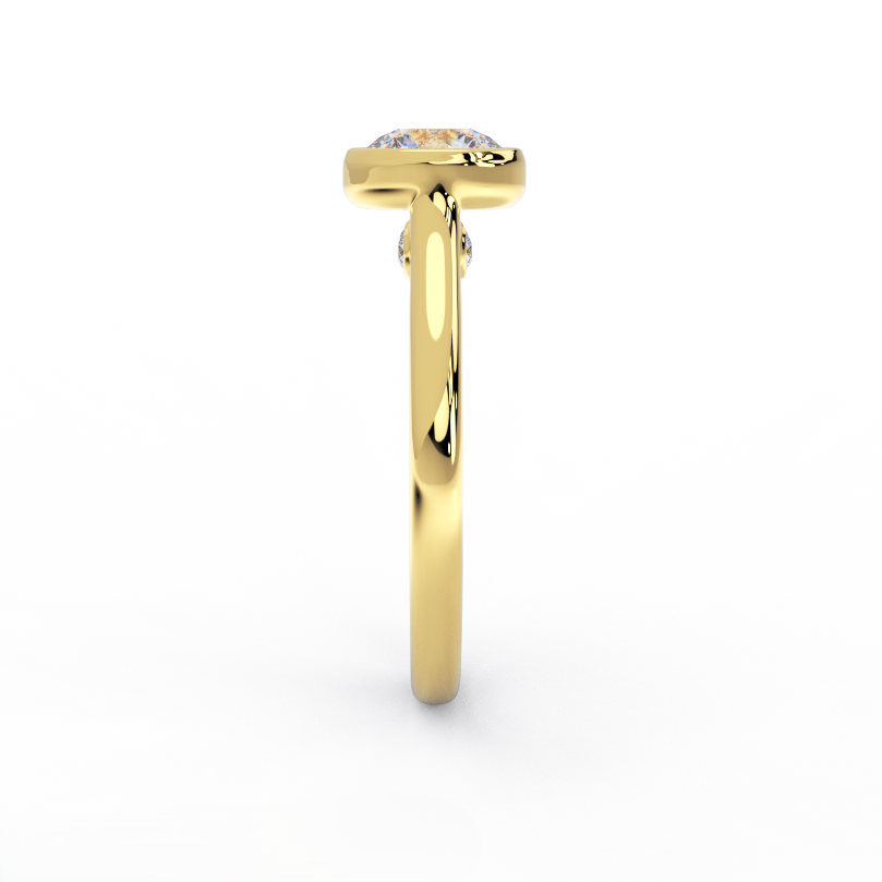 Side profile of bezel set round diamond solitaire ring in 14K yellow gold