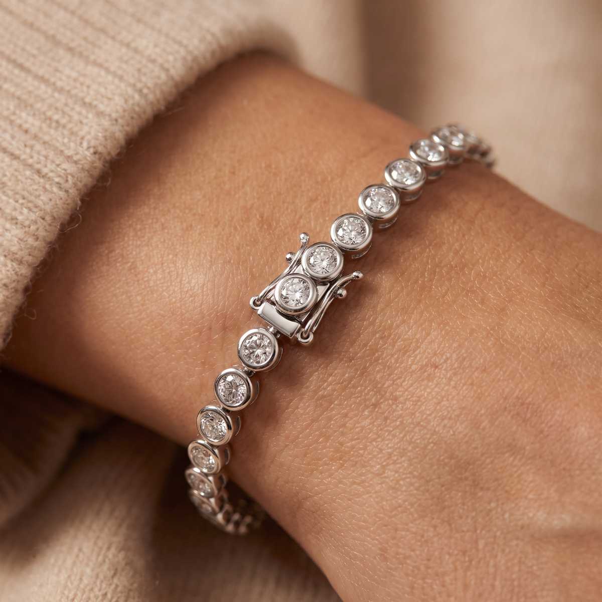 Bezel tennis bracelet in 14K white gold with Lab-Grown Diamonds worn on the wrist