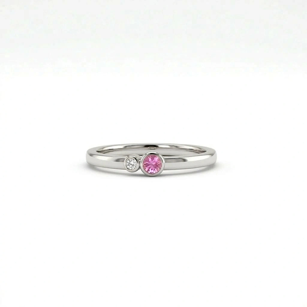 Bezel set diamond and pink sapphire duo ring in 14k white gold front view