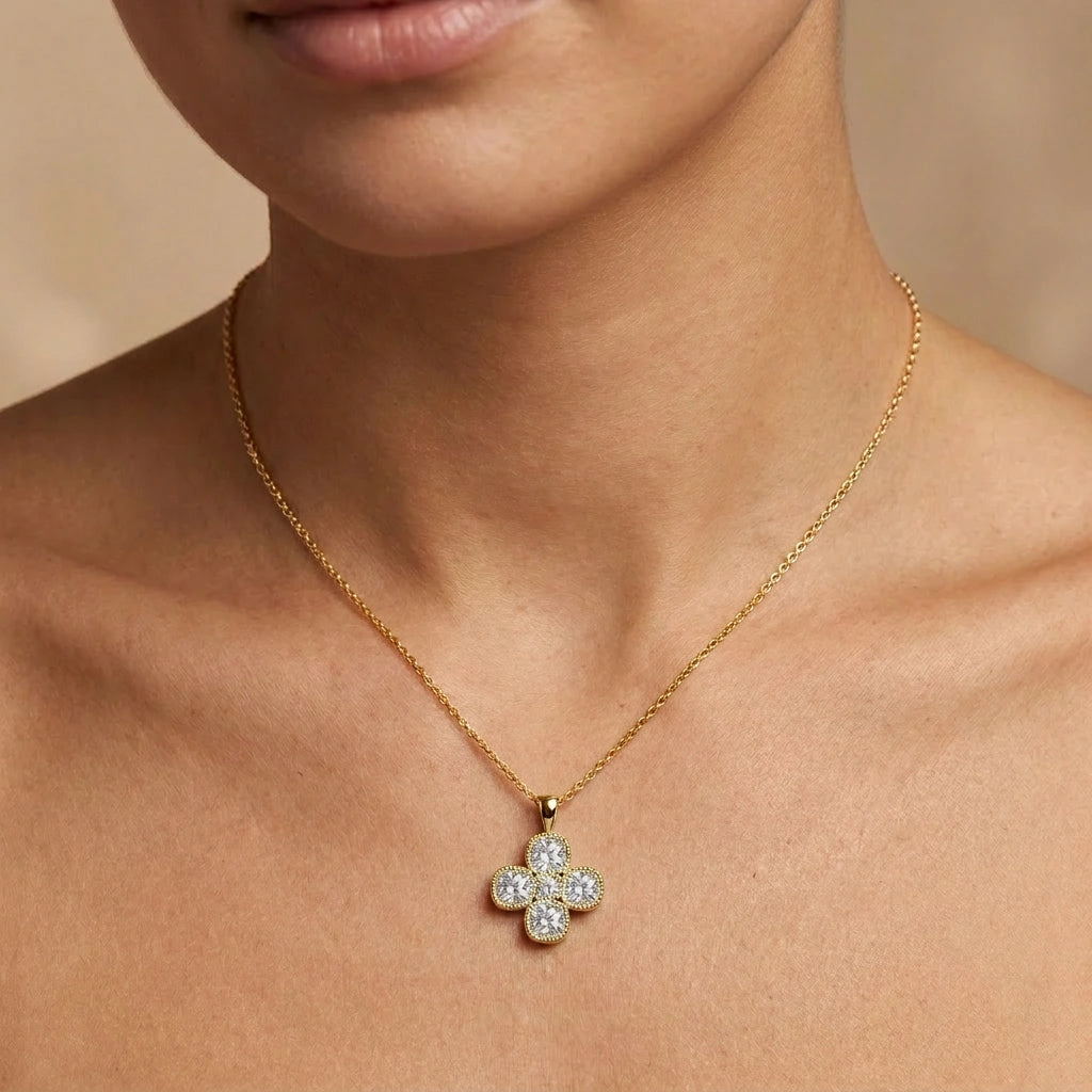 Model wearing a cushion-cut Lab-Grown Diamond clover pendant in 14K yellow gold on a cable chain — Black Pearl of Queens