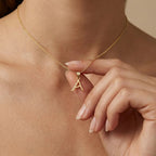 BPQ Script Initial Necklace in solid 14K yellow gold, letter A pendant worn on model, minimalist personalized jewelry