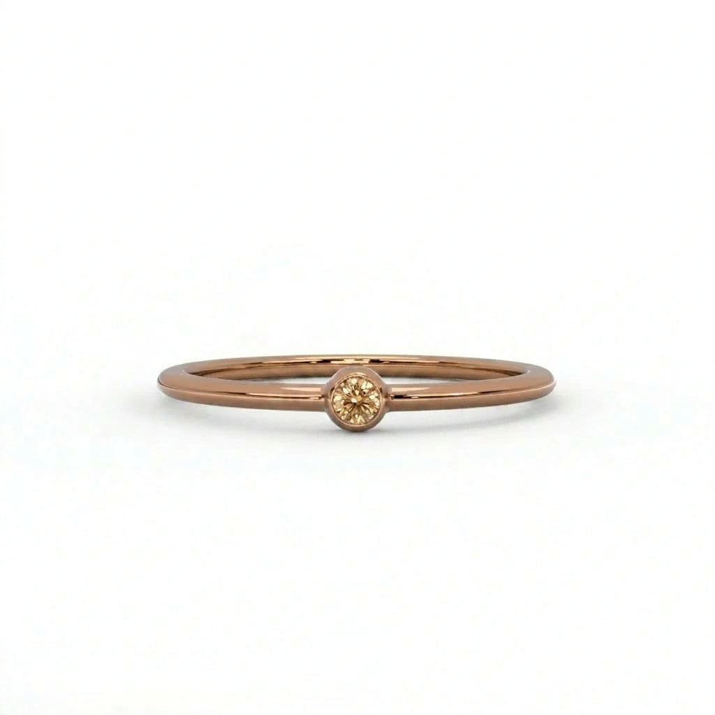 Natural champagne diamond bezel-set stacking ring in 14K brown gold, front view — Black Pearl of Queens