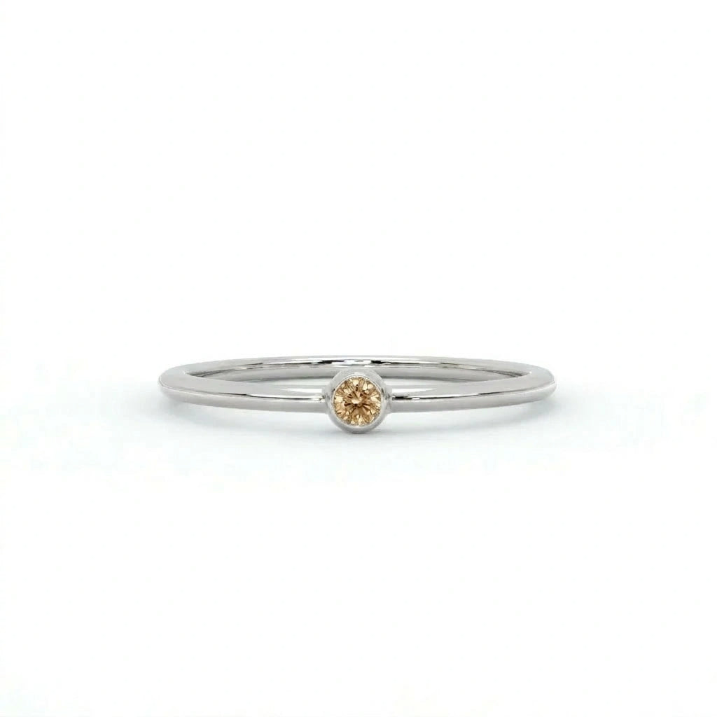 Natural champagne diamond bezel-set stacking ring in 14K white gold, front view — Black Pearl of Queens