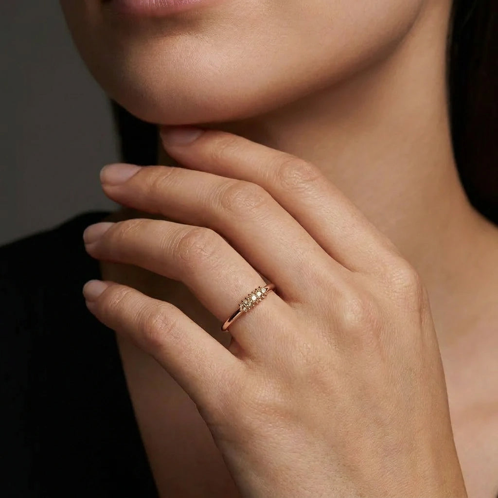 Champagne diamond pavé cluster band in 14K brown gold worn on hand — Black Pearl of Queens