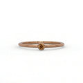 Natural cognac diamond bezel-set stacking ring in 14K brown gold, front view — Black Pearl of Queens