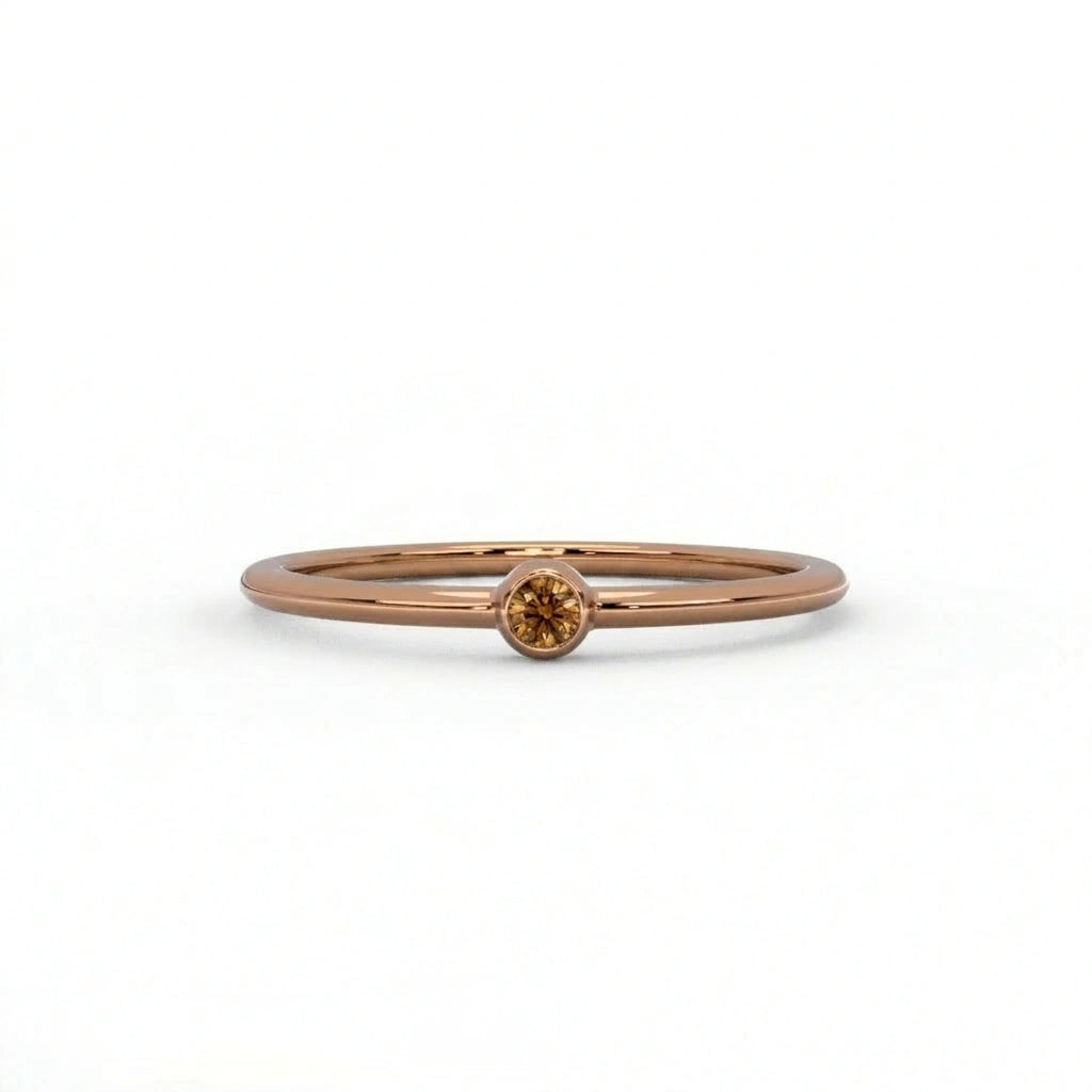 Natural cognac diamond bezel-set stacking ring in 14K brown gold, front view — Black Pearl of Queens