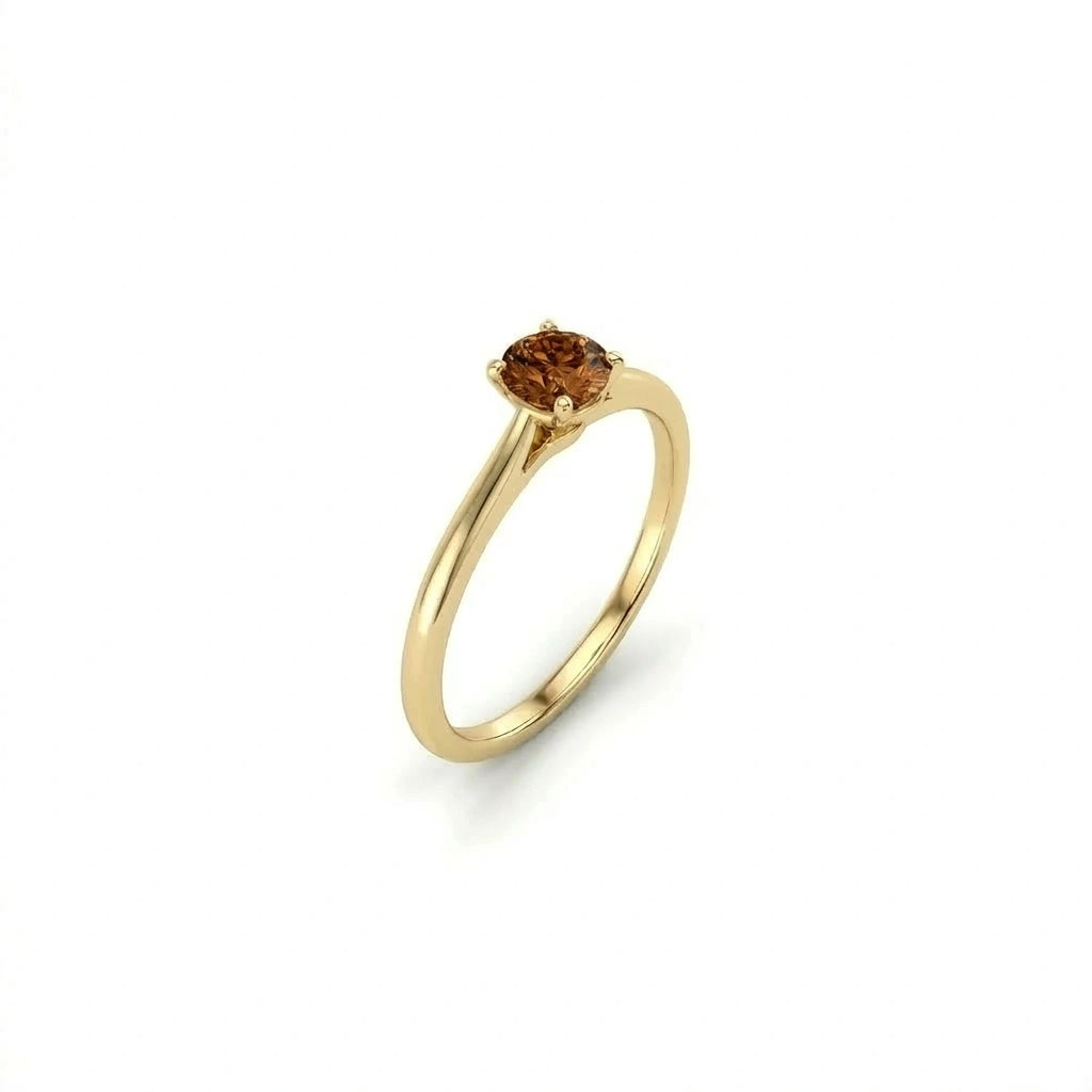 Cognac diamond solitaire engagement ring in 14K yellow gold, three-quarter angle — Black Pearl of Queens
