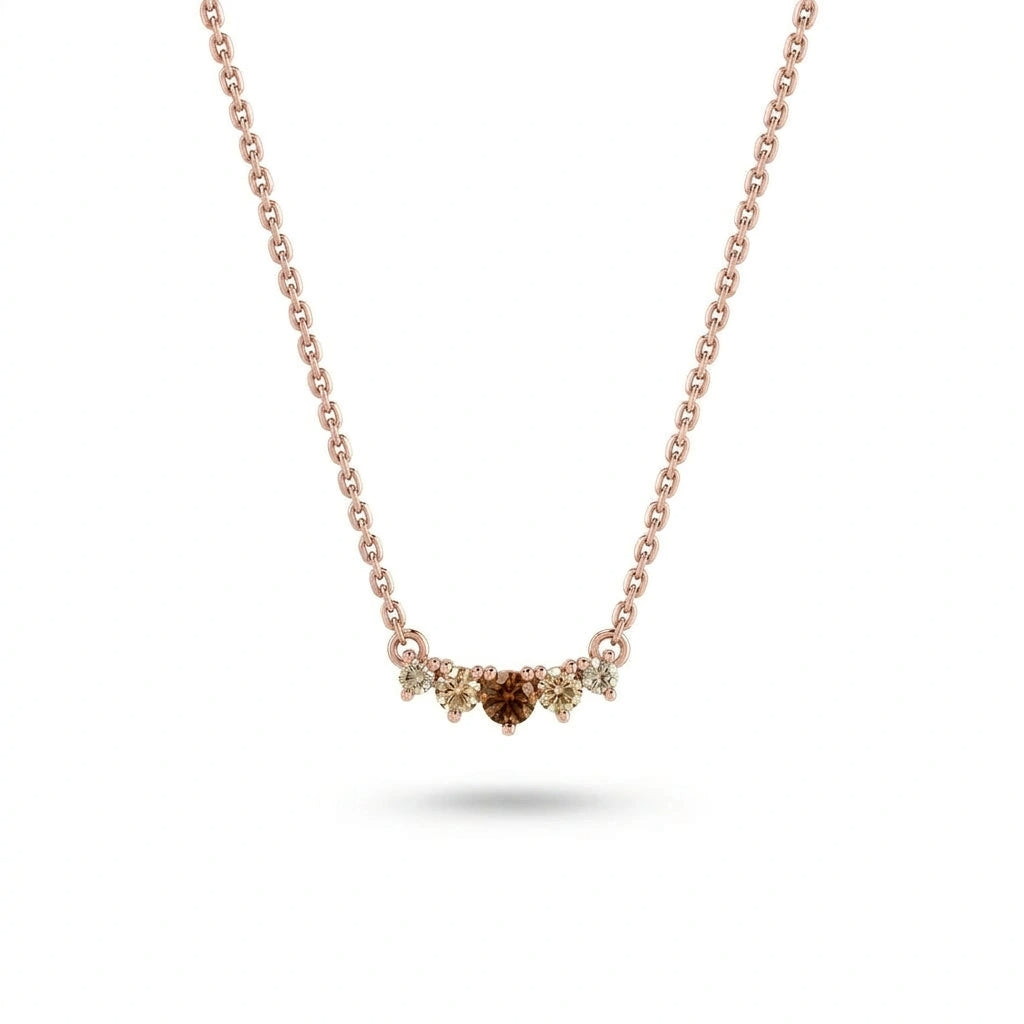 Graduated five-stone natural cognac and champagne diamond curved bar necklace in 14K rose gold, front view — Black Pearl of Queens