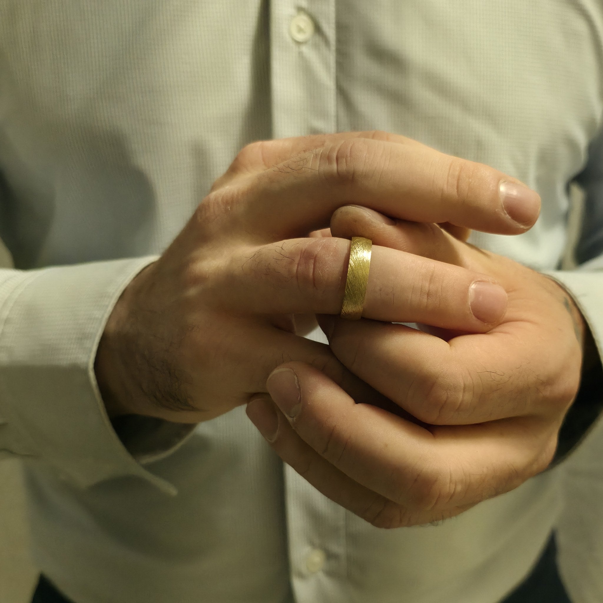 Handcrafted 14K brushed gold wedding band, 6mm comfort fit design worn on finger, made in New York
