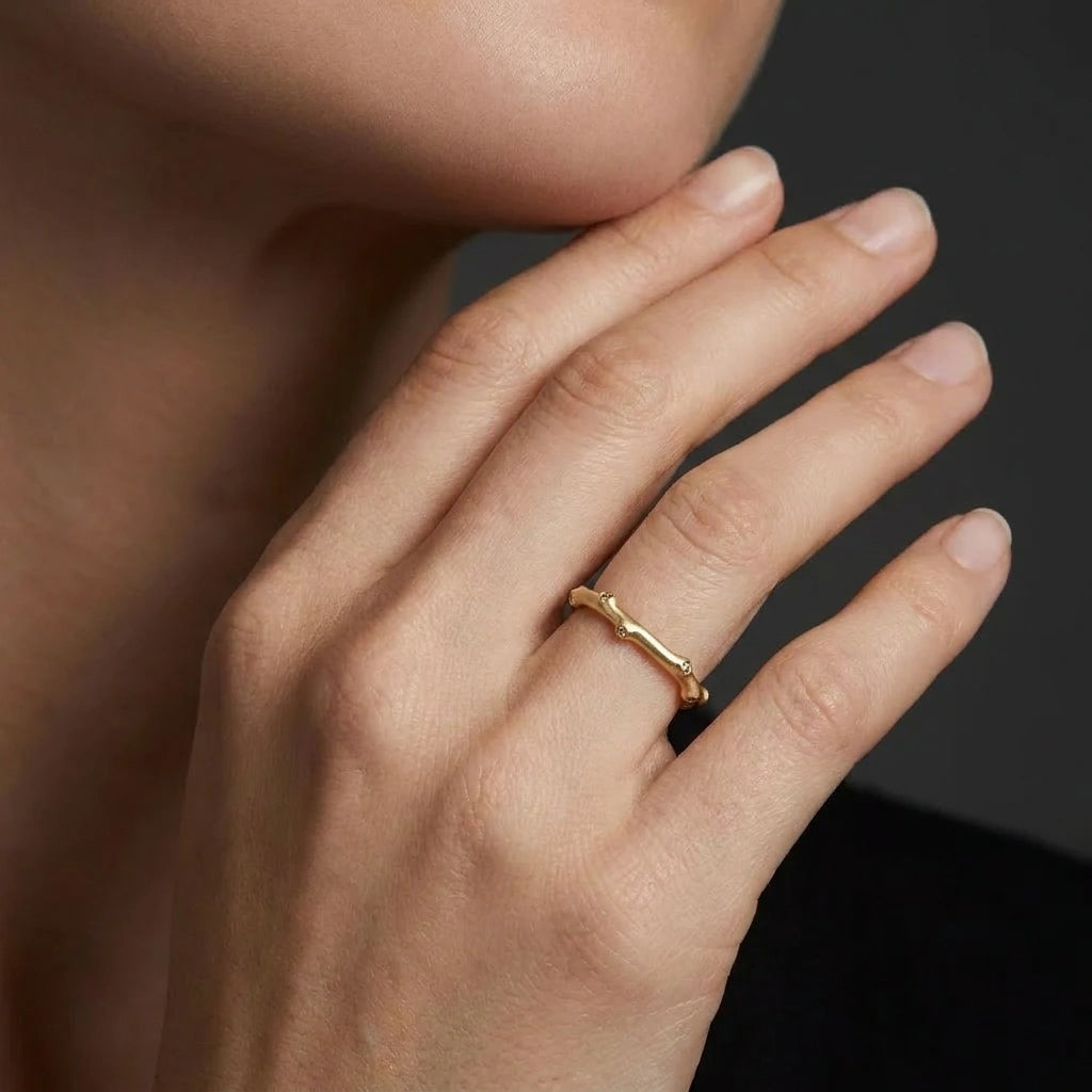 Model wearing champagne diamond bamboo ring in 14K brown gold — Black Pearl of Queens Brownstone Collection