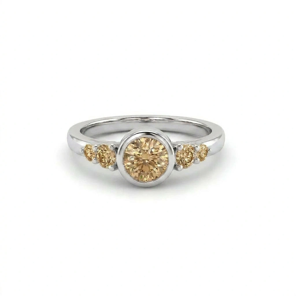 Natural champagne diamond bezel engagement ring in 14K white gold with graduated accent stones