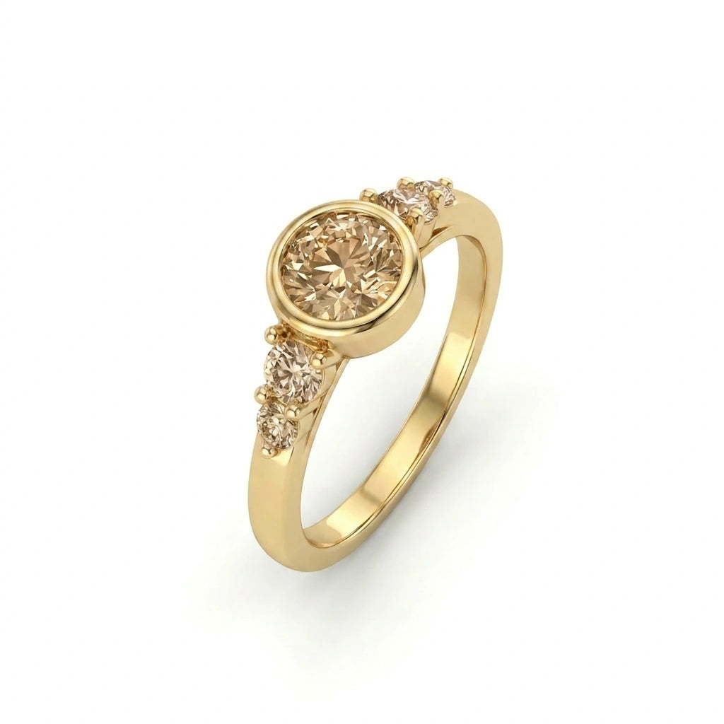 Natural champagne diamond bezel engagement ring in 14K yellow gold, angled view