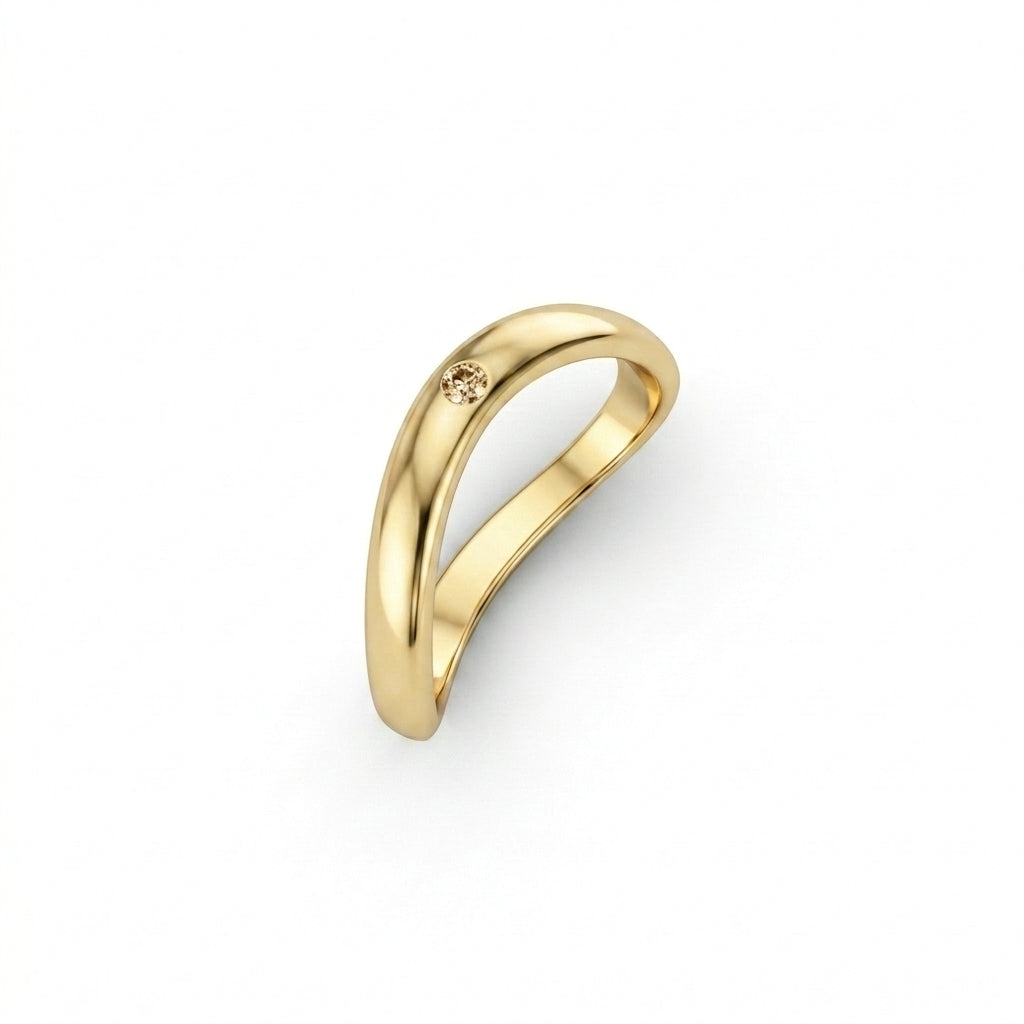 Champagne diamond curved wedding band in 14K yellow gold, angled view, natural champagne diamond contour nesting band