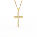 Channel-set diamond cross pendant in 14K yellow gold - handcrafted NYC diamond cross jewelry