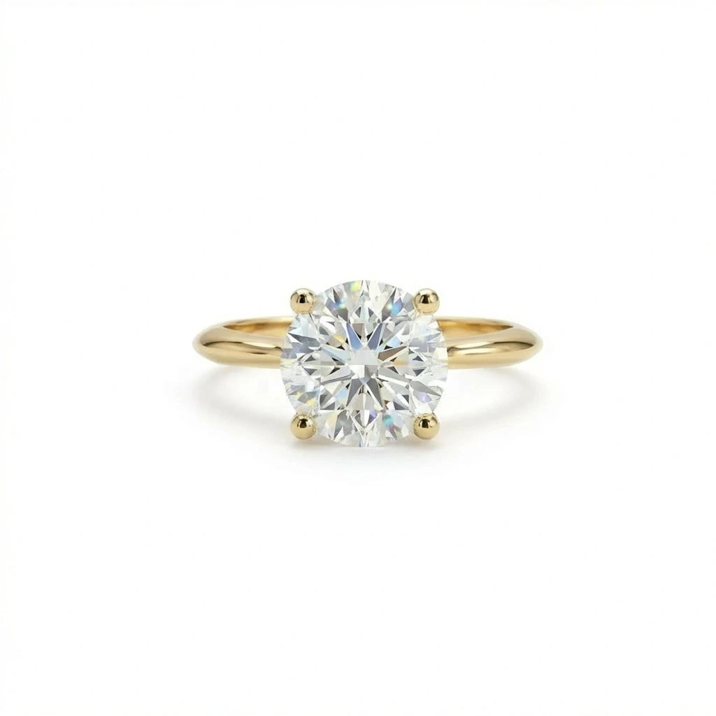 1.5ct classic round diamond solitaire engagement ring in 14K yellow gold - top view showing brilliant sparkle