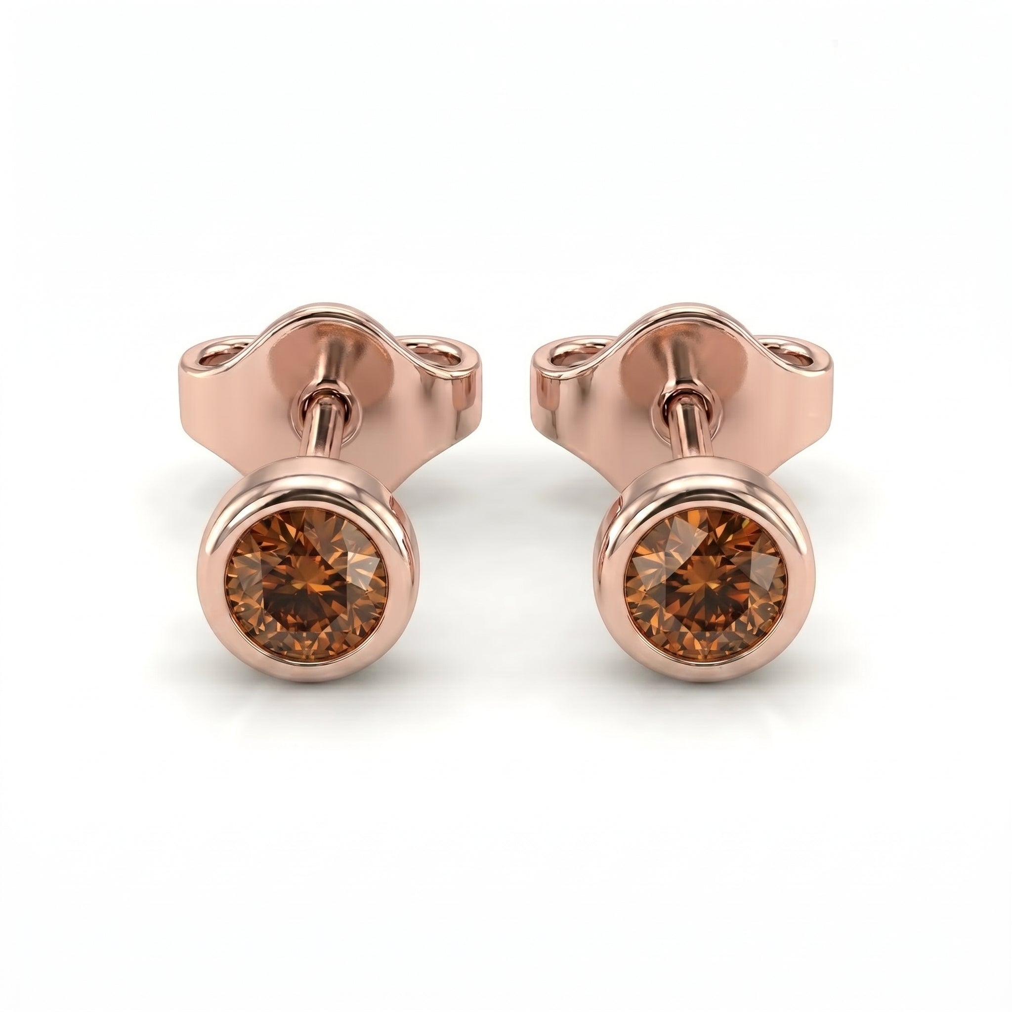 Natural cognac diamond bezel stud earrings in 14K rose gold — pair product view on white background
