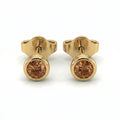 Natural cognac diamond bezel stud earrings in 14K yellow gold — pair product view on white background