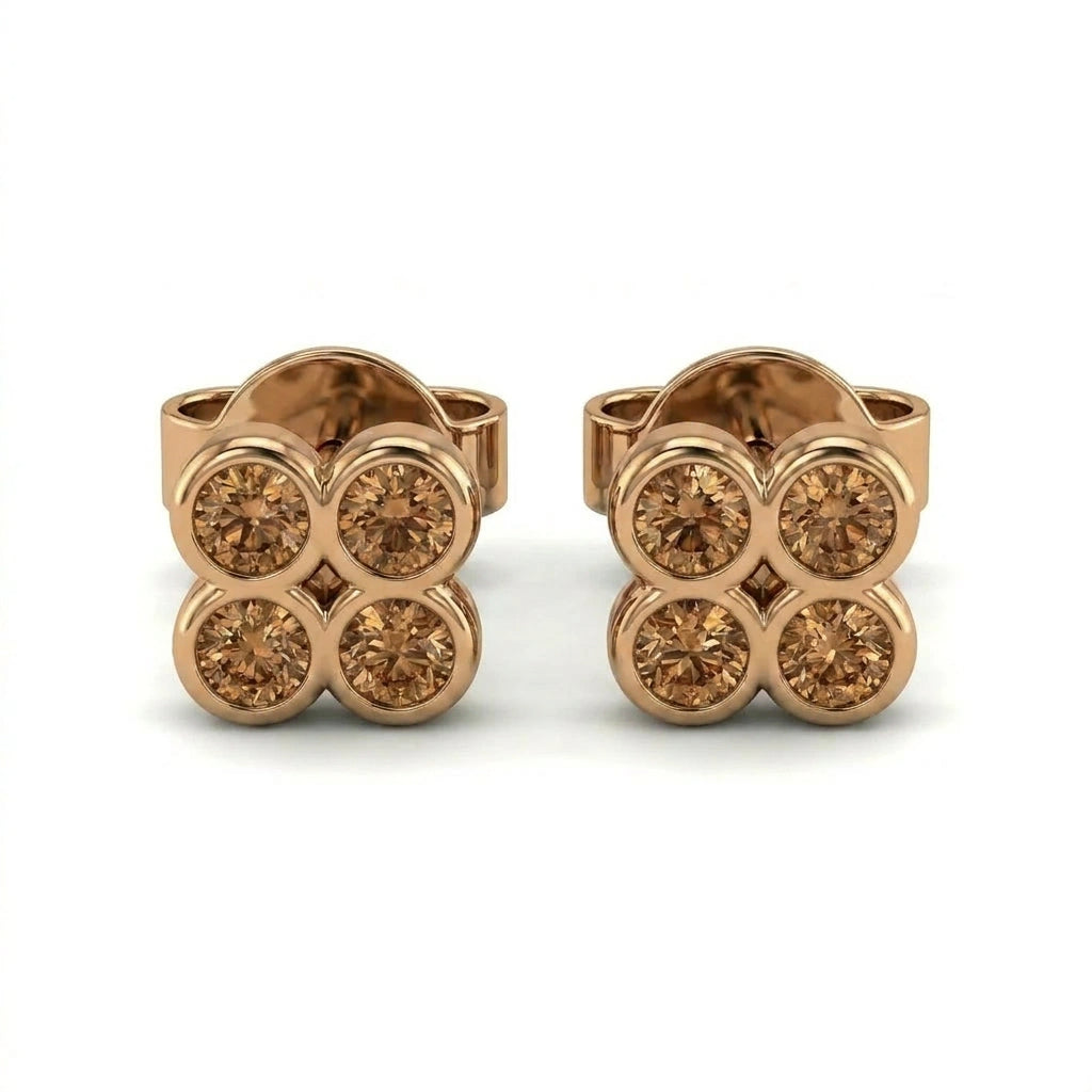 Natural cognac diamond clover stud earrings in 14K brown gold — angled product view on white background
