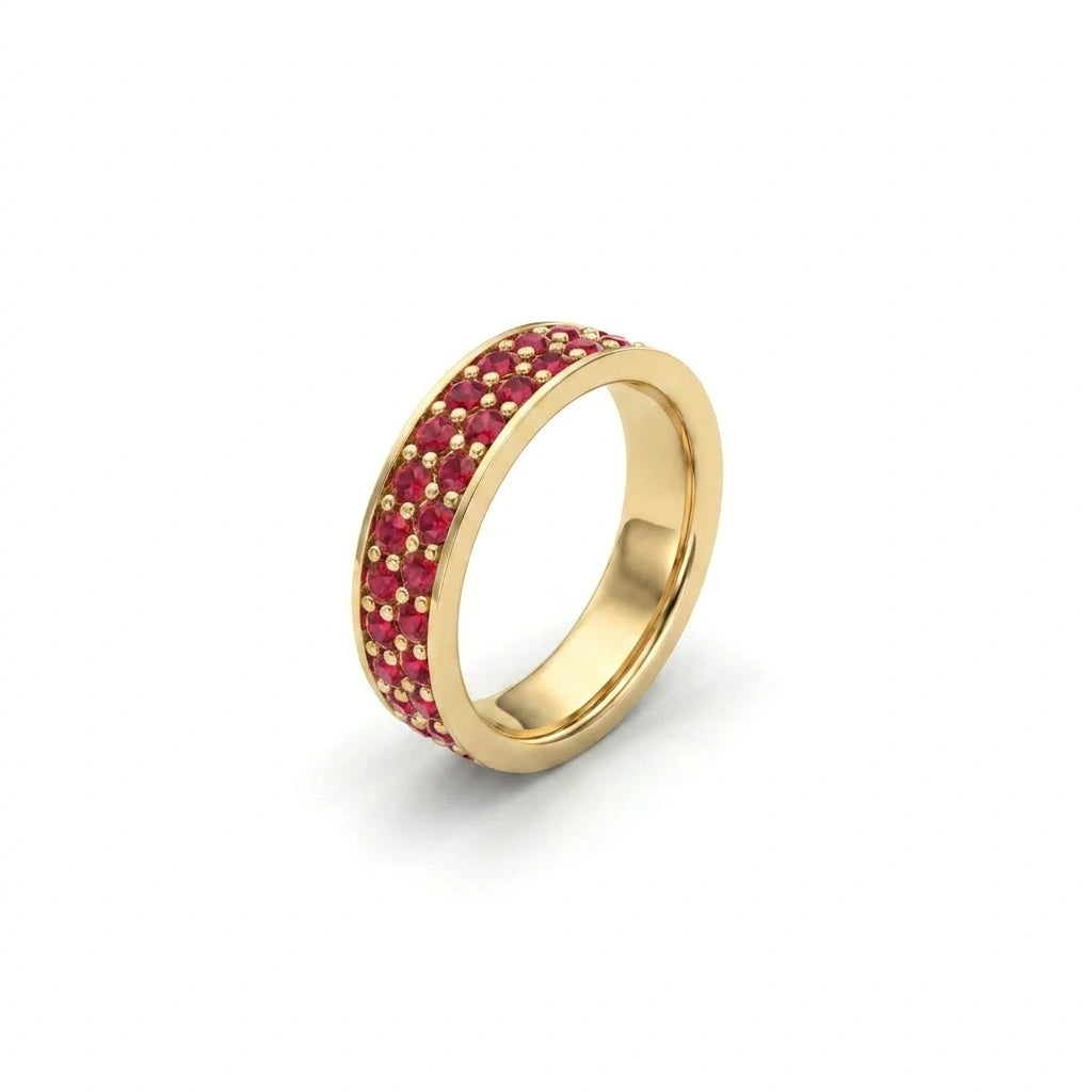 Close-up of Crimson Eternity ruby ring showing double row pavé setting in yellow gold