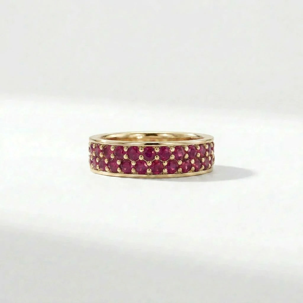 Double row ruby eternity ring in 14K yellow gold with full pavé gemstone setting