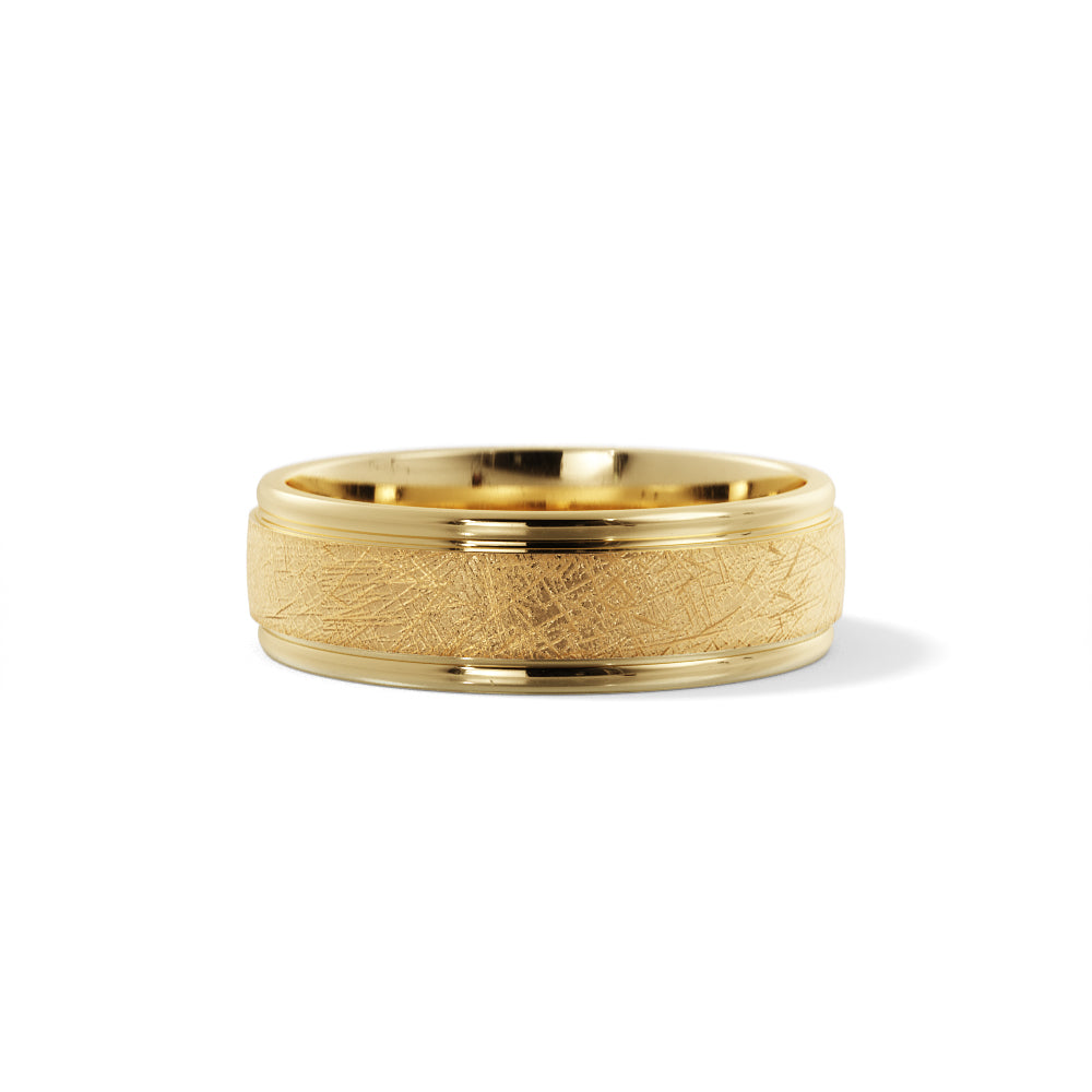 Cross-brushed wedding band finish in solid 14K gold with directional textured surface