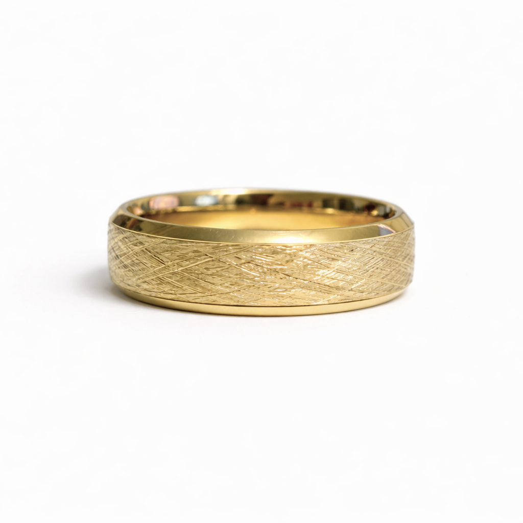 Solid 14K yellow gold wedding band with cross-hatched textured surface