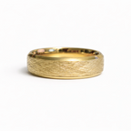 Solid 14K yellow gold wedding band with cross-hatched textured surface