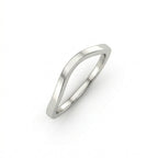 Curved wedding band in 14K white gold, angled view, plain high-polish contour band