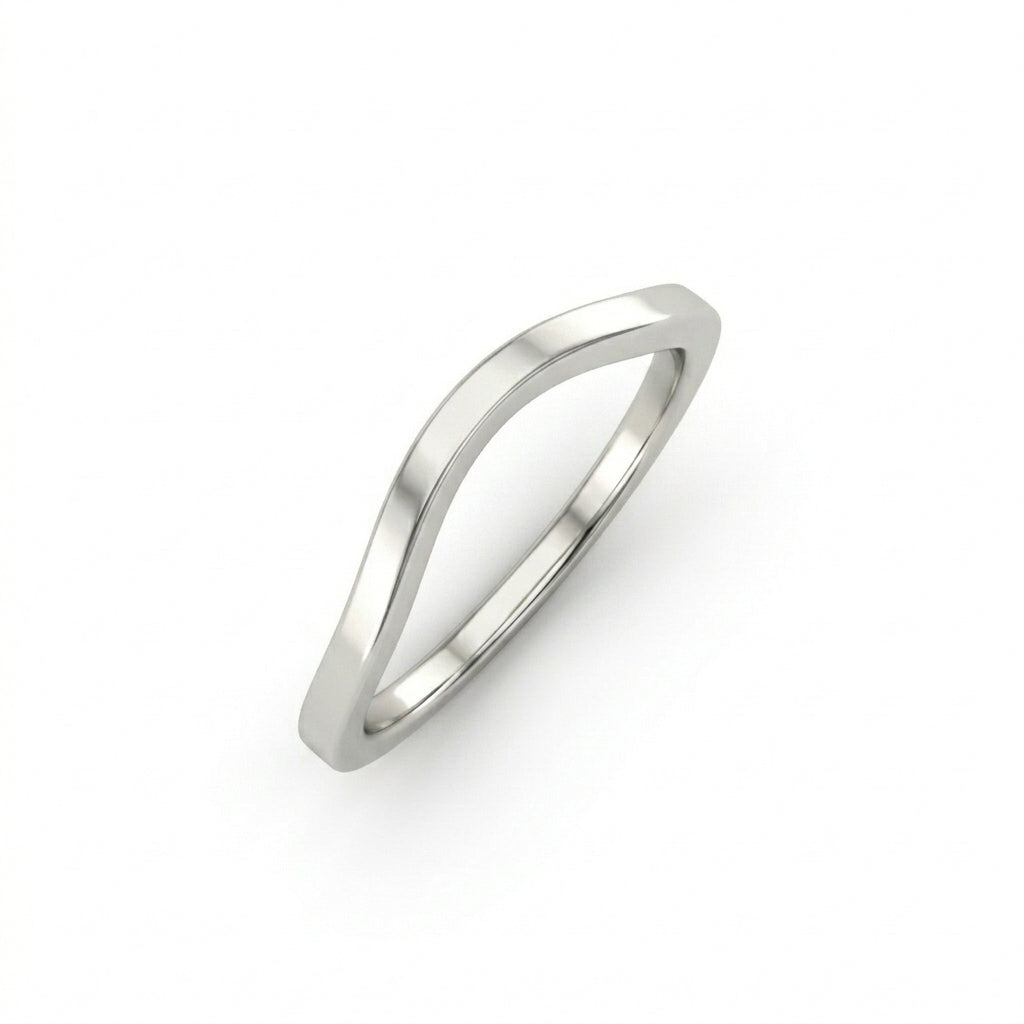 Curved wedding band in 14K white gold, angled view, plain high-polish contour band