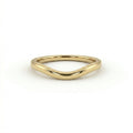 Curved wedding band in 14K yellow gold, plain high-polish contour nesting band