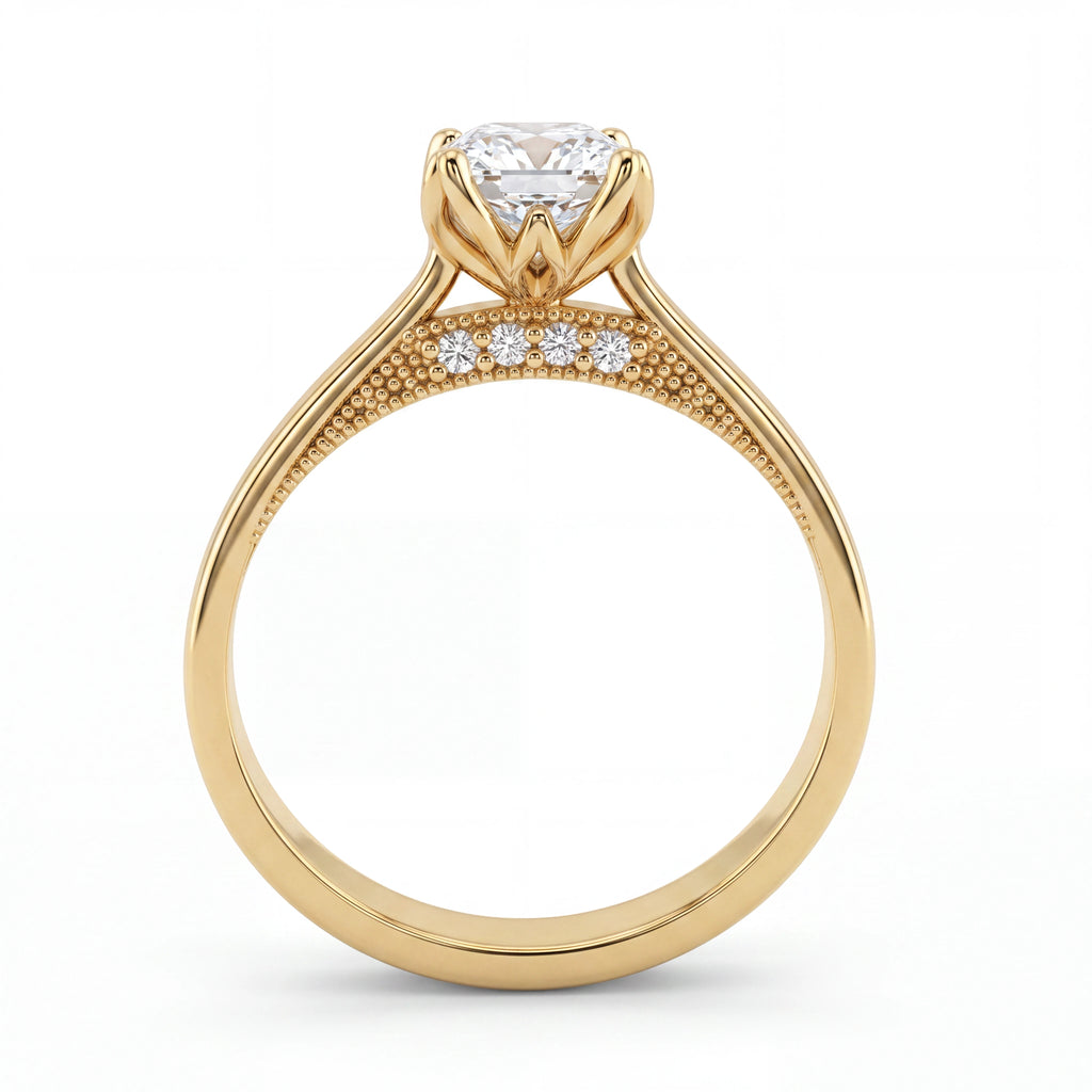 Cushion cut lotus prong milgrain Lab-Grown Diamond engagement ring in 14K yellow gold, front close-up showing gallery diamond accents and milgrain detail — Black Pearl of Queens