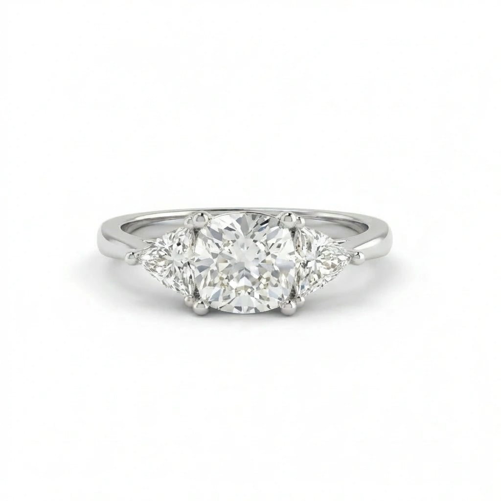 Cushion three-stone engagement ring in 14K white gold, 2ct cushion Lab-Grown Diamond centre with trillion side stones